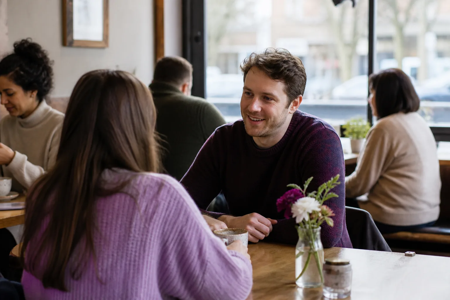 Person creating an online dating profile at home in Tayside